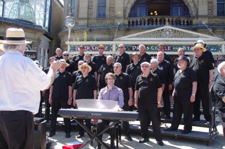 Tideswell Male Voice Choir perform outside the Opera House