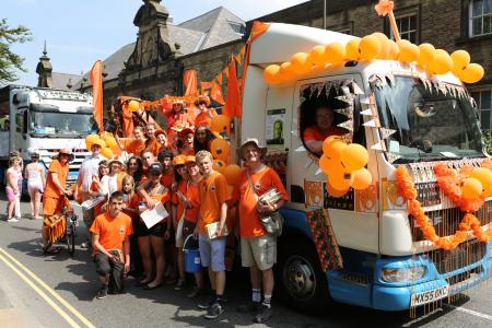 The team in orange at Carnival 2013 (credit: Ian J Parkes)