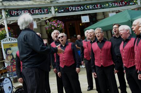 Tideswell Male Voice Choir on the Opera House forecourt