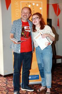 Robbie Carnegie presents the Youth Actor award to Eleanor Hibbert