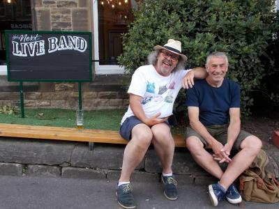Musician Peter Buxton and Fringe volunteer Ben outside The Old Clubhouse