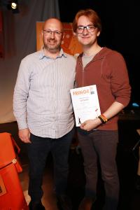 Fringe committee's Stephen Walker with Comedy winner Marcus Crabb, right (credit: Ian J. Parkes)