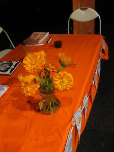 Fringe marigolds adorn the judging table (DO)