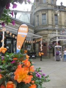 Buxton in Bloom's floral displays have more than a hint of Fringe orange this year. (credit: Stephanie Billen 2019)