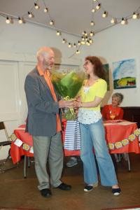 In his final Awards Ceremony as Fringe Chair, Keith Savage receives a bouquet from vice chair Maria Carnegie (credit: Ian J. Parkes)