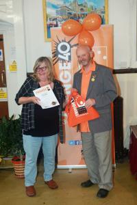 Discover Buxton Tours' Netta Christie receiving the Chair Award from Keith Savage at Fringe40 (credit: Ian J. Parkes)