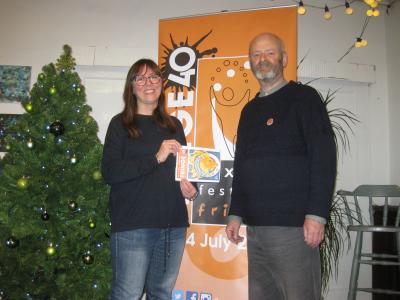 Catherine Webb with her winning design Roar Talent alongside Fringe chair Keith Savage posing at The Green Man Gallery