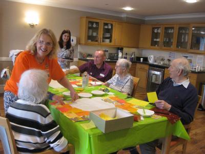 The Fringe's Linda Rolland helps residents at Haddon Hall Care Home make Fringe40 banners as part of our Community Links programme 2019