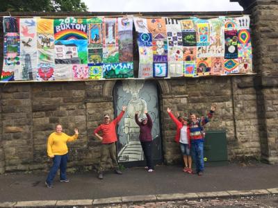 Banners from Two Left Hands' Alternative Well Dressing pictured with Friends of Buxton Station during Fringe 2020 (credit: Two Left Hands)