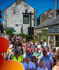 Crowds outside the Cheshire Cheese on carnival day (credit: Alan Wilkinson, Chapel Camera Club 2022)