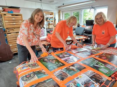 A familiar team get to work on the poster collage for the Fringe's carnival float (SB)