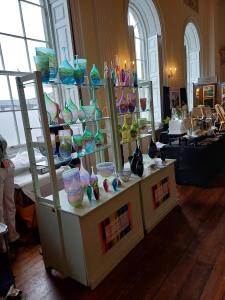 Glassware provides a light show at Art at the Crescent (SB)