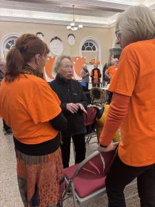 The Fringe's Catherine and Julie chatting to desk volunteer Susan Reiblein (MK)