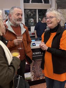 Friends coordinator Jeanette Hamilton welcomes newcomers Hilary and Adrian Vickers (MK)