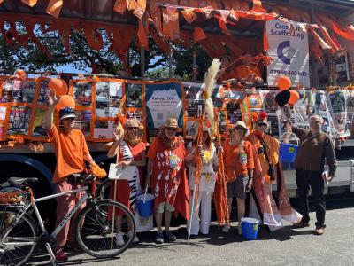 The team takes a breather on carnival day (credit: Moira Kean 2025)