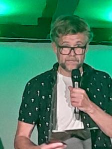 Still going strong - compere Rob Rouse (RH)