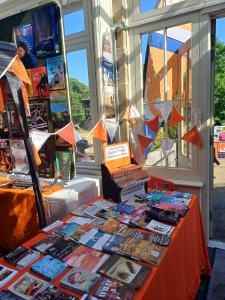 A sea of orange at the Fringe Information Desk (credit: Stephanie Billen 2026)