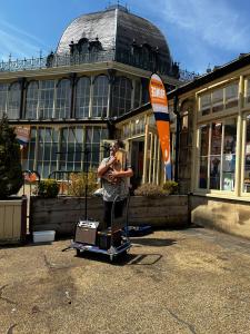 Songbird Anna busking with a song from her show, Bloodlines and Ballads 