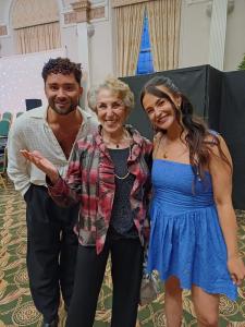 Edwina Currie flanked by West End star Matthew Croke and singer-songwriter Sophie-Grace at Peak Voices Choir Buxton's Curtain Up! Last Night of the Fringe (credit: Stephanie Billen 2026)