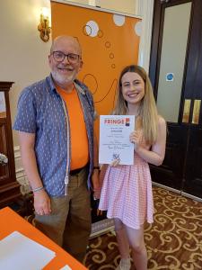 Robbie Carnegie with award-winning Youth Actor Darcy Cassidy from The Pendleton Codebreakers at the Buxton Fringe Awards 2026 (credit: Stephanie Billen)