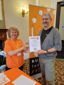 Curtis Bollington accepts the Music: Small Ensemble - Popular Tradition Award on behalf of Ben Holder & Co (SB 2026)