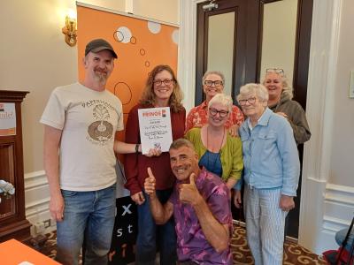 Two Left Hands at the Fringe Awards 2026: Dan Rhode, Fiona Holland, Kate Barrett, Gillian Wright (back row),
 Jules M. Scott , Christine Holland (middle row) and Dave Carlisle (front) (credit: Stephanie Billen)