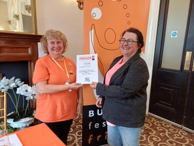 Fringe Vice Chair Carole Garner with Alice de Cent from Underground as she accepts the Children's Event Award on behalf of Sweet Productions/Stories Alice for Valhalla Awaits (SB 2026)
