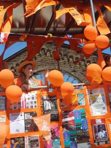 Darcy Cassidy from The Pendleton Codebreakers aboard the float as it passes Buxton railway station (credit: Dan Osborne 2026)