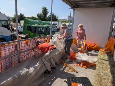 The bare lorry starts to be transformed at Lomas Distribution's Waterswallows site with the help of Steph, Pam and Moira (DO)