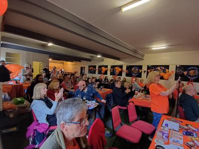 An emotional crowd applauds performances at the Programme Party (SB)