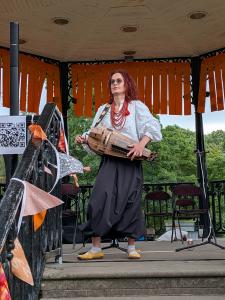 Iryna Muha plays her hurdy-gurdy to promote her show Ukrainian Folk and Beyond (credit: Dan Osborne)