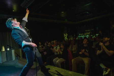 Sir Dickie Benson Energising the Audience. ©Gary Cooper Photography.