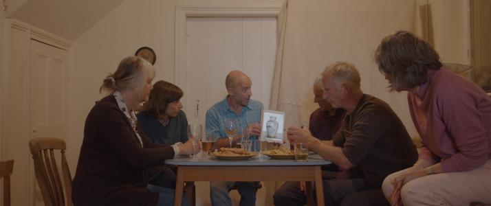 The villagers meet to plan their enterprise